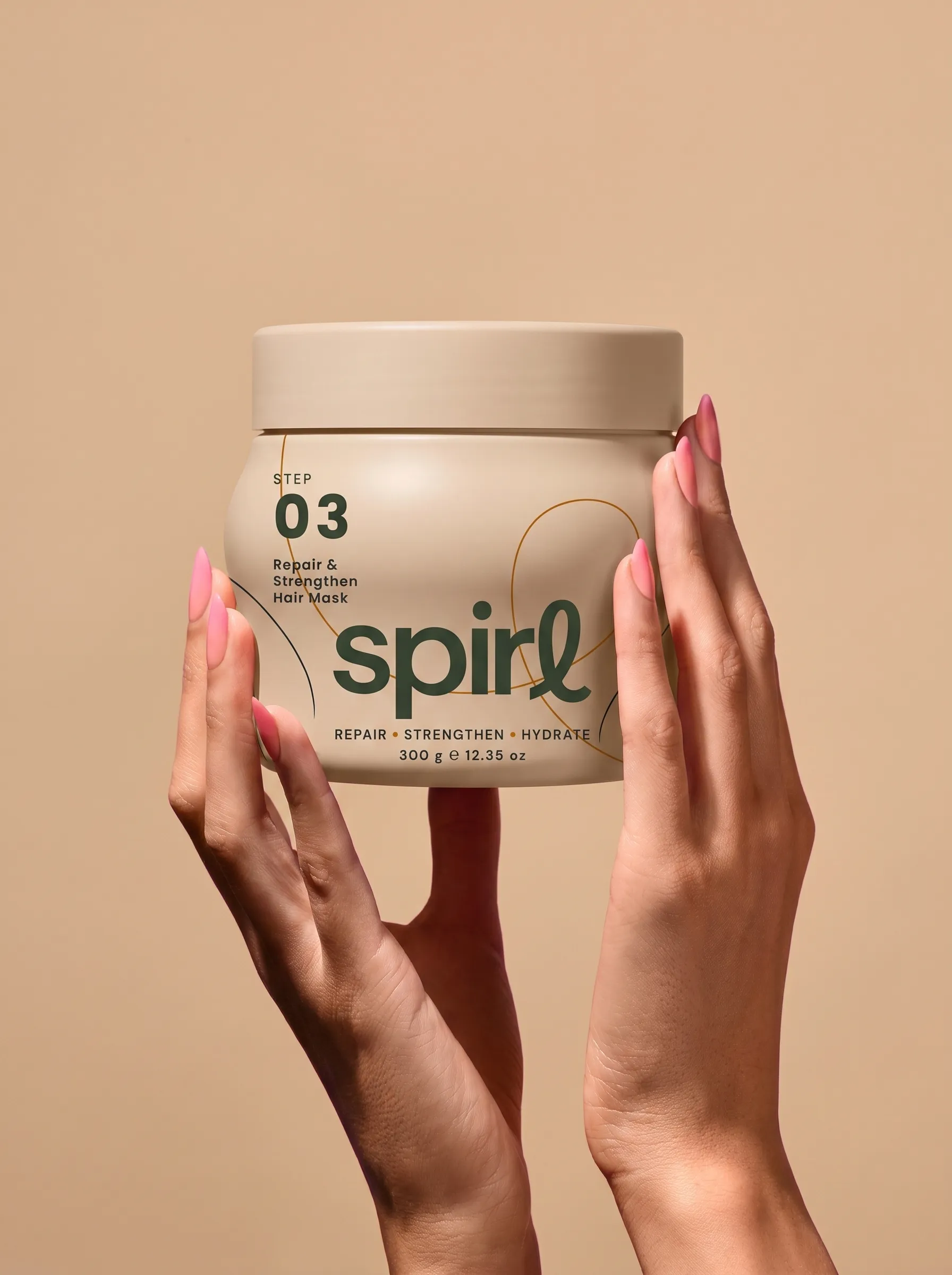 Hands presenting the Step 03 Repair & Strengthen Hair Mask jar